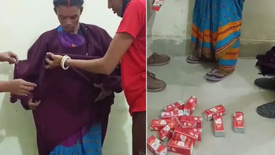 என்னது இது…! புர்காவுக்குள் இருந்த பாக்கெட்டுகள்…. “அதை” பார்த்து ஷாக்கான போலீஸ்…. அதிரடி நடவடிக்கை….!!